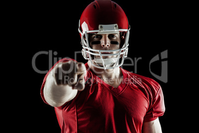 American football player pointing at camera