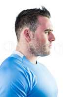 Tough rugby player looking away