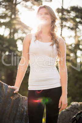 Young happy jogger looking at something in the distance