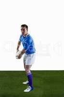 Rugby player about to throw a rugby ball