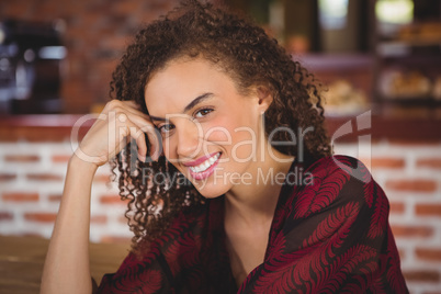 Pretty hipster woman at the cafe