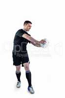 Rugby player doing a side pass