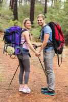 Portrait of a young happy hiker couple