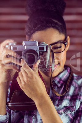 Young hipster taking a picture