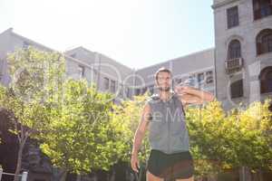 Handsome athlete holding kettle bell