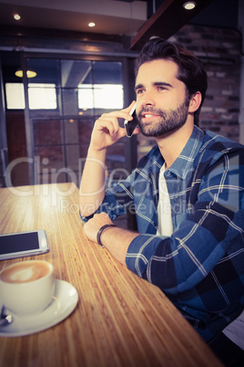 Young student calling a client