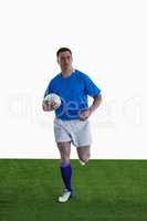 Rugby player running with the rugby ball