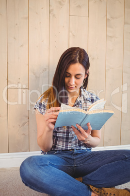 Pretty hipster reading blue book