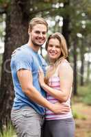 Portrait of a young happy hiker couple