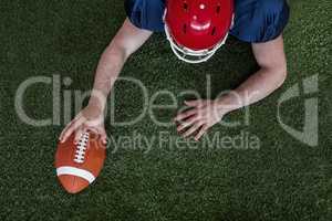 American football player scoring a touchdown