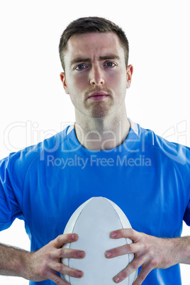 Rugby player holding a rugby ball