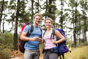 Portrait of young happy hikers