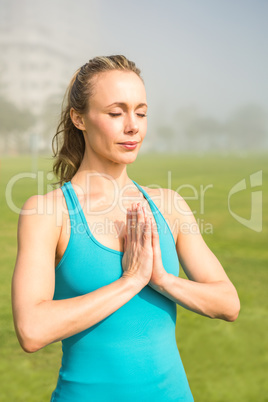 Peaceful fit blonde meditating Peaceful fit blonde meditating