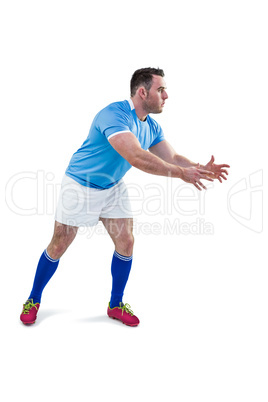 Rugby player throwing the ball