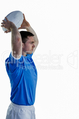 Rugby player about to throw a rugby ball