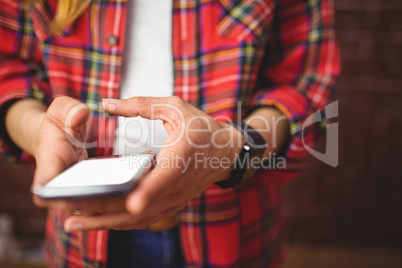 Hipster using her smartphone