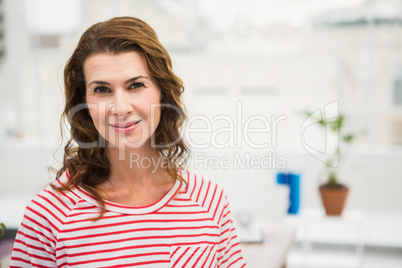 Casual businesswoman smiling to camera