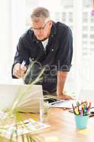 Attentive businessman working on a laptop