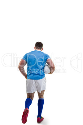 Rugby player running with the ball