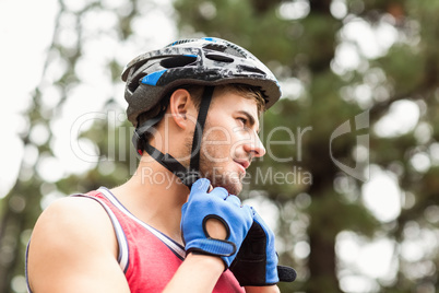 Handsome young biker looking away