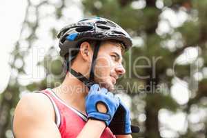 Handsome young biker looking away