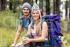 Portrait of a young smiling hiker couple