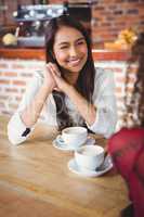 Female friends having coffee