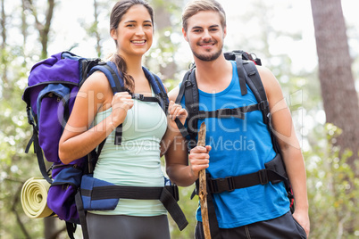 Young happy joggers looking at the camera