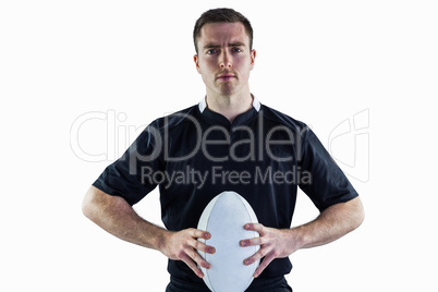 Rugby player holding a rugby ball