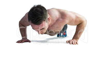 Strong bodybuilder doing press up