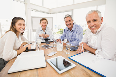 Smiling business people during a meeting