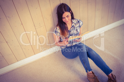 Pretty hipster reading blue book