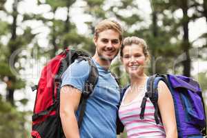 Portrait of young happy hikers