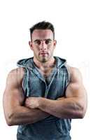 Handsome bodybuilder with arms crossed