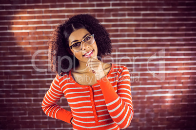 Smiling attractive young woman thinking