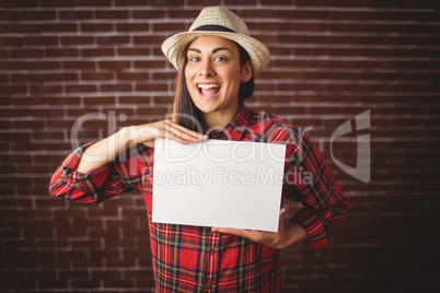 Beautiful hipster showing white card
