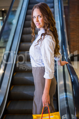 Pretty woman by the escalator
