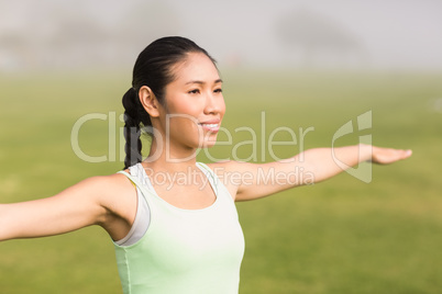 Smiling sporty woman working out