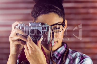 Young hipster taking a picture