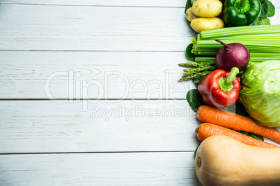 Line of vegetables on table