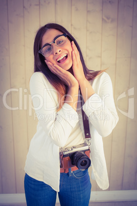 Pretty hipster using her vintage camera