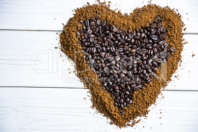 Coffee on a table in heart shape