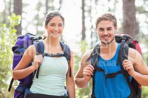 Happy joggers looking at camera