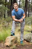 Portrait of a handsome man holding a water bottle