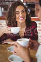 Female friends having coffee