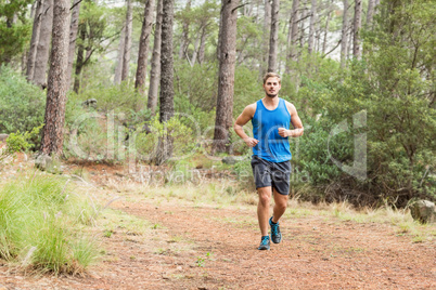 Young happy jogger running