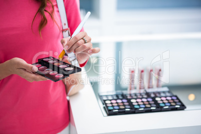 Pretty woman shopping for make up