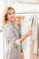 Smiling woman browsing clothes