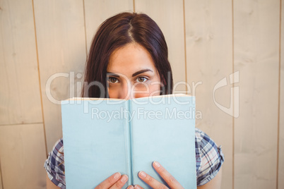 Pretty hipster reading blue book