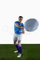 Rugby player about to throw a rugby ball